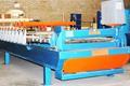industry machinary machinary دستگاه ساندویچ پانل سقفی و دیواری 09121007760