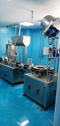 industry machinary machinary دستگاه پرکن و دربند بسته بندی مایعات دارویی