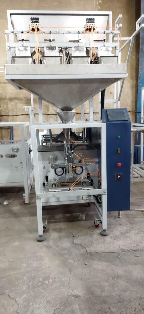 دستگاه بسته بندی چهار توزین مینی برای بسته بندی انواع مواد گرانولی  نظیر (شکر، نمک، حبوبات، خشکبار، قند، چای، تخمه آفتابگردان، پسته، بادام ، غلات، سوی industry machinary machinary